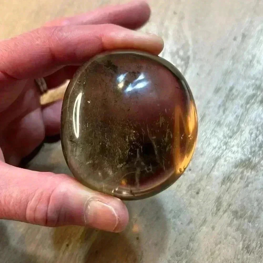 Smoky quartz.oval 2 1/4 inches.